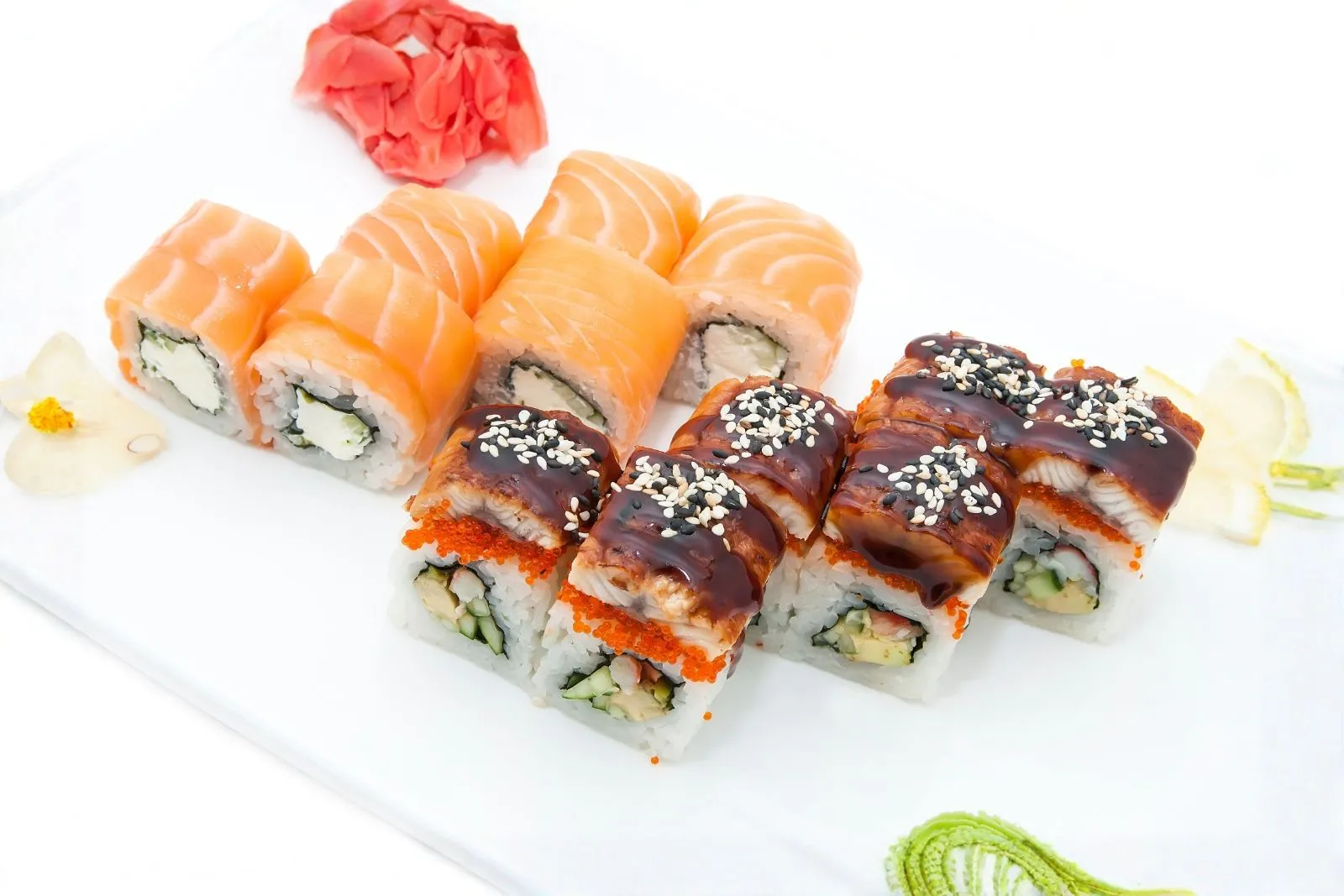Mixed sushi roll platter with salmon cream rolls and glazed eel sushi rolls